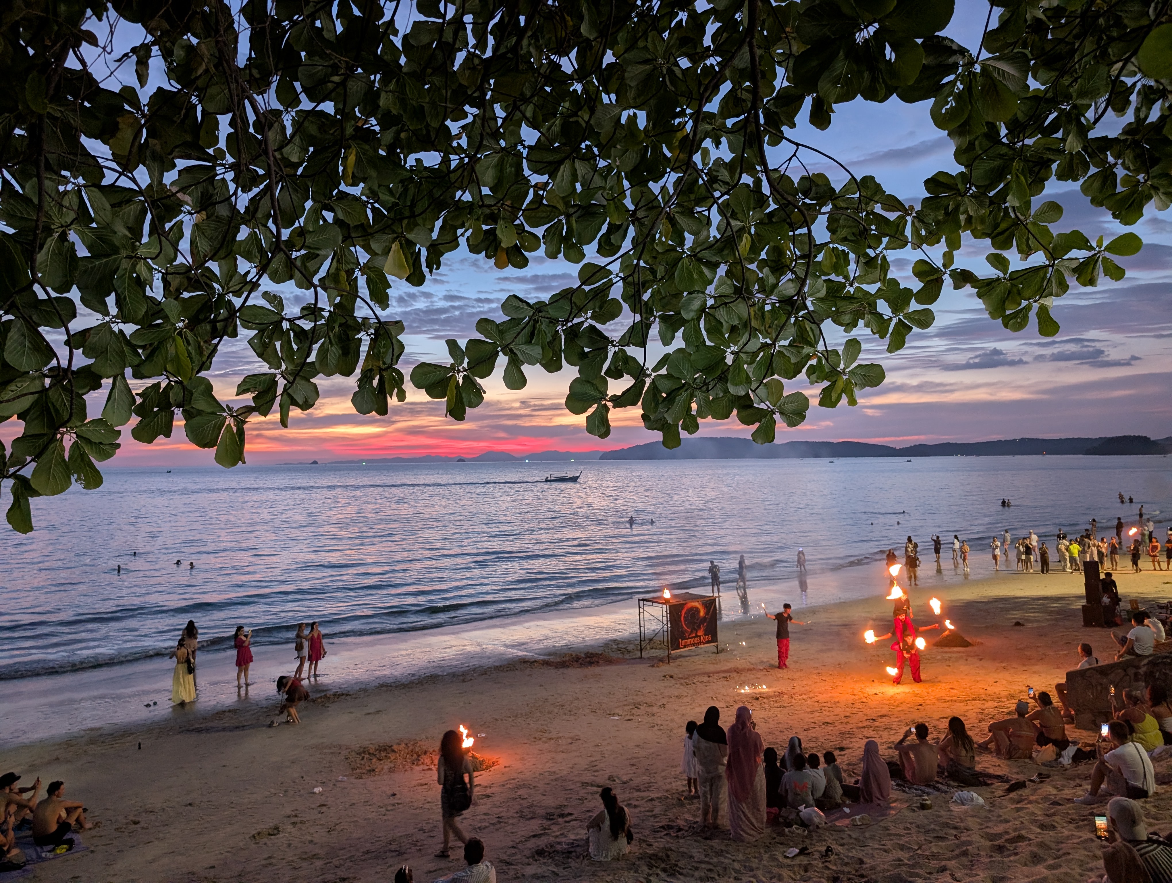 A fire dancer performing on the Ao Nang beach at night